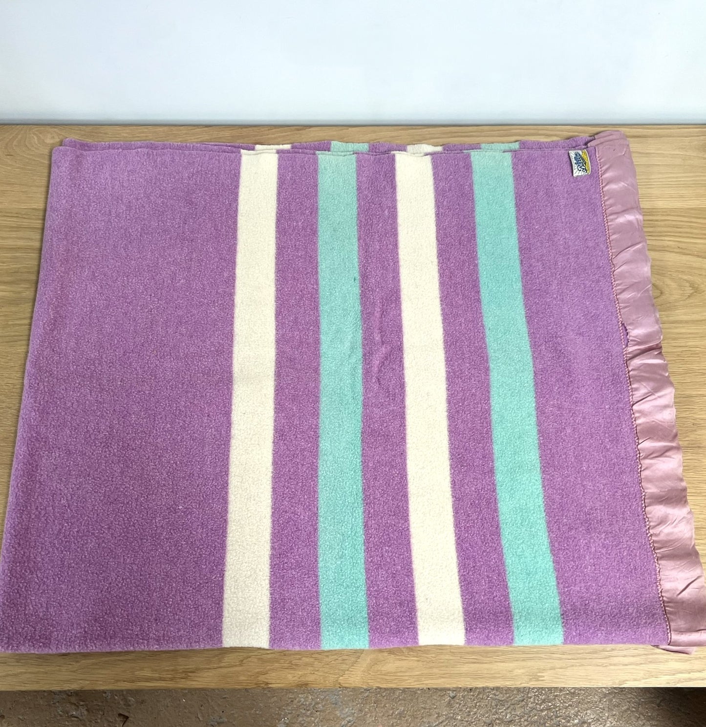 Striped Baron Vintage wool blanket with purple, green, and white stripes 