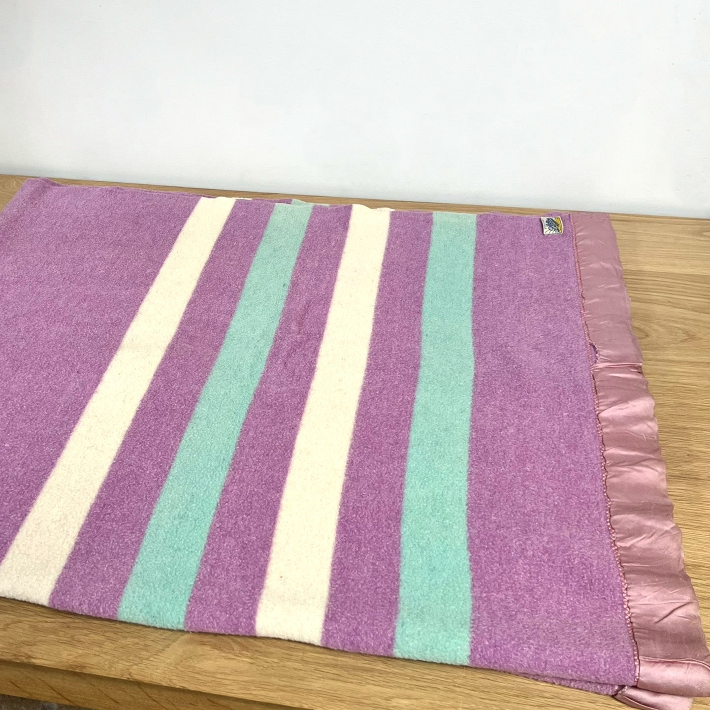 Striped Baron Vintage wool blanket with purple, green, and white stripes 